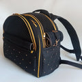 Vanilly quilted pet backpack. Made of waterproof quilted fabric with cotton lining.