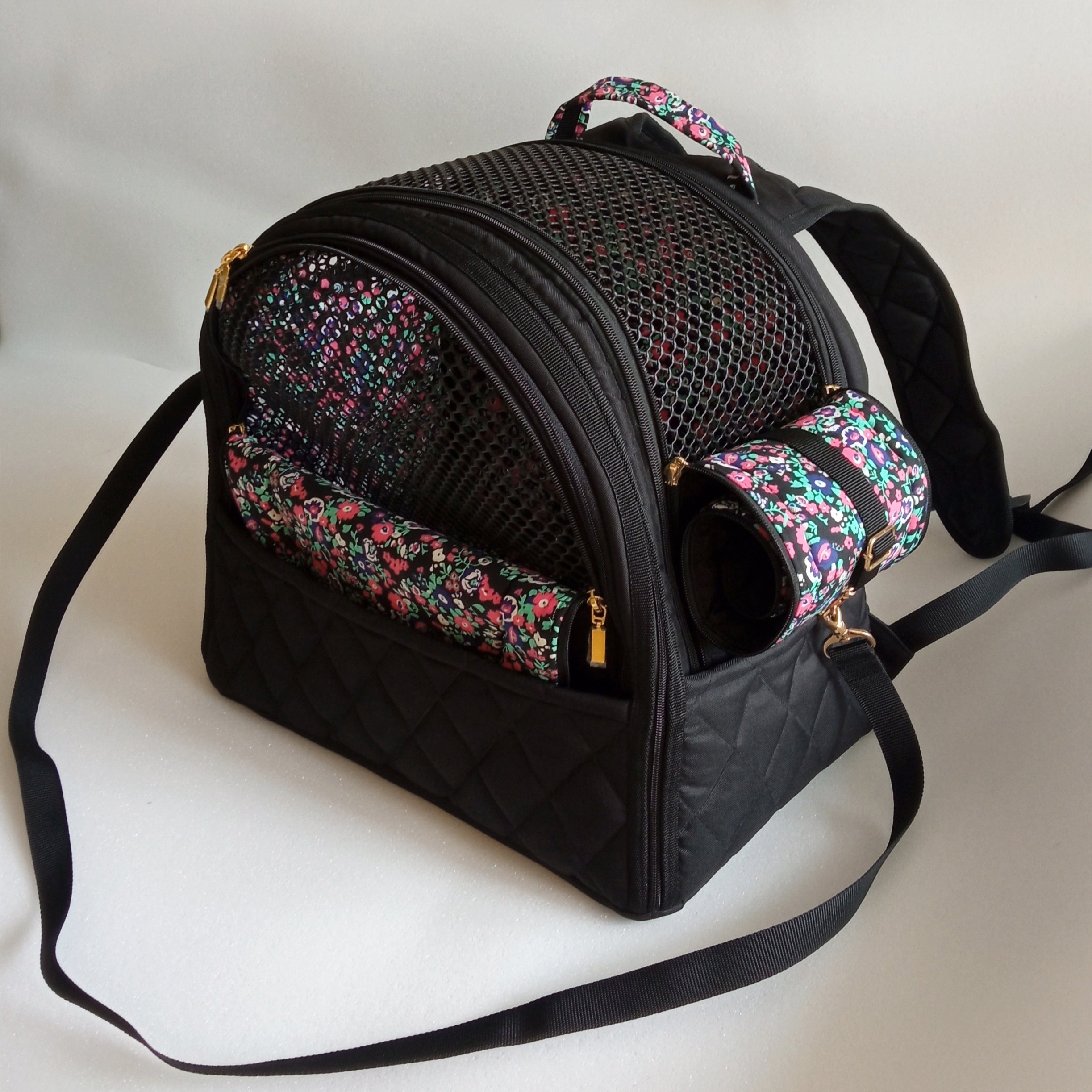 Pet backpack for small dogs and cats ( Black fabric with floral cotton lining)