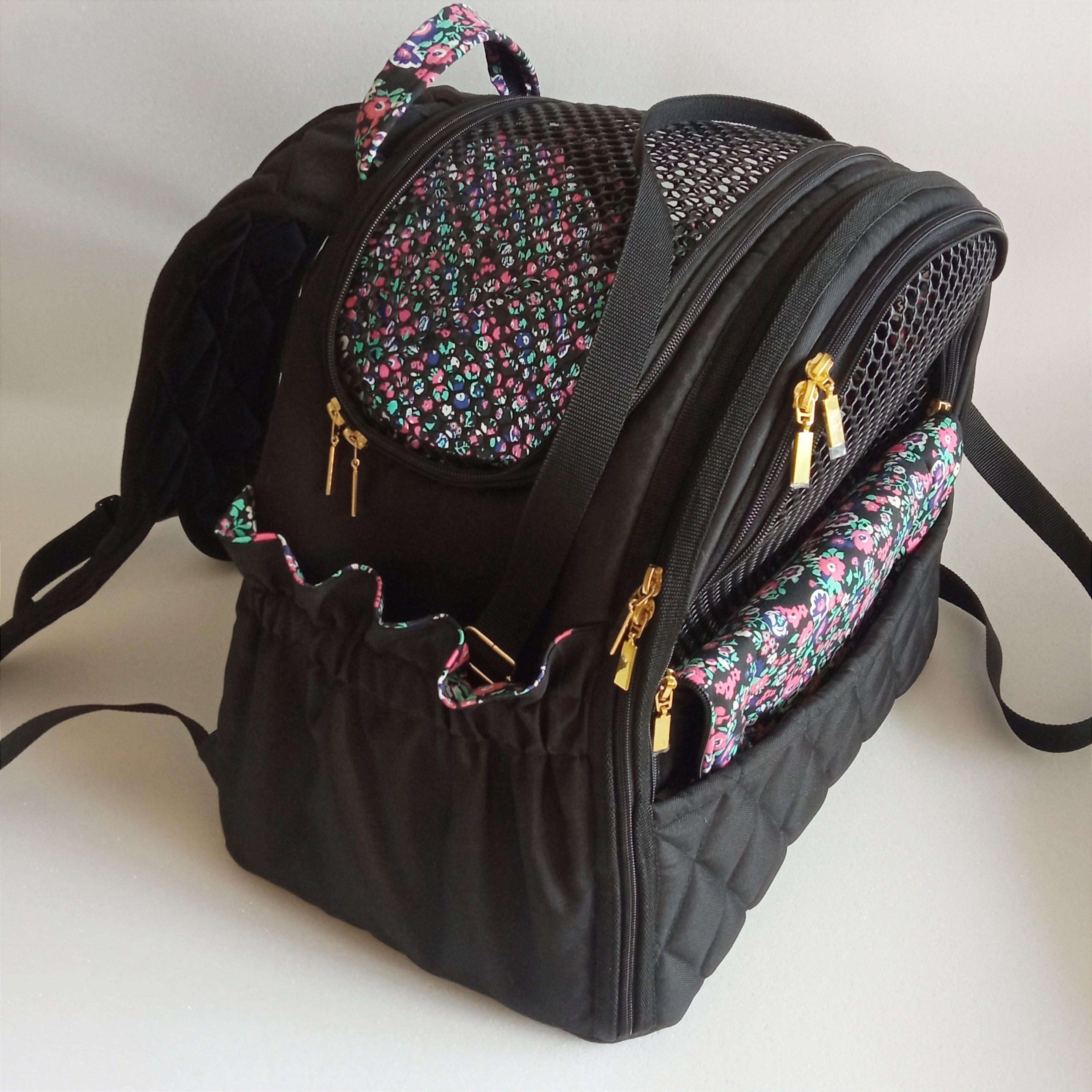 Pet backpack for small dogs and cats ( Black fabric with floral cotton lining)