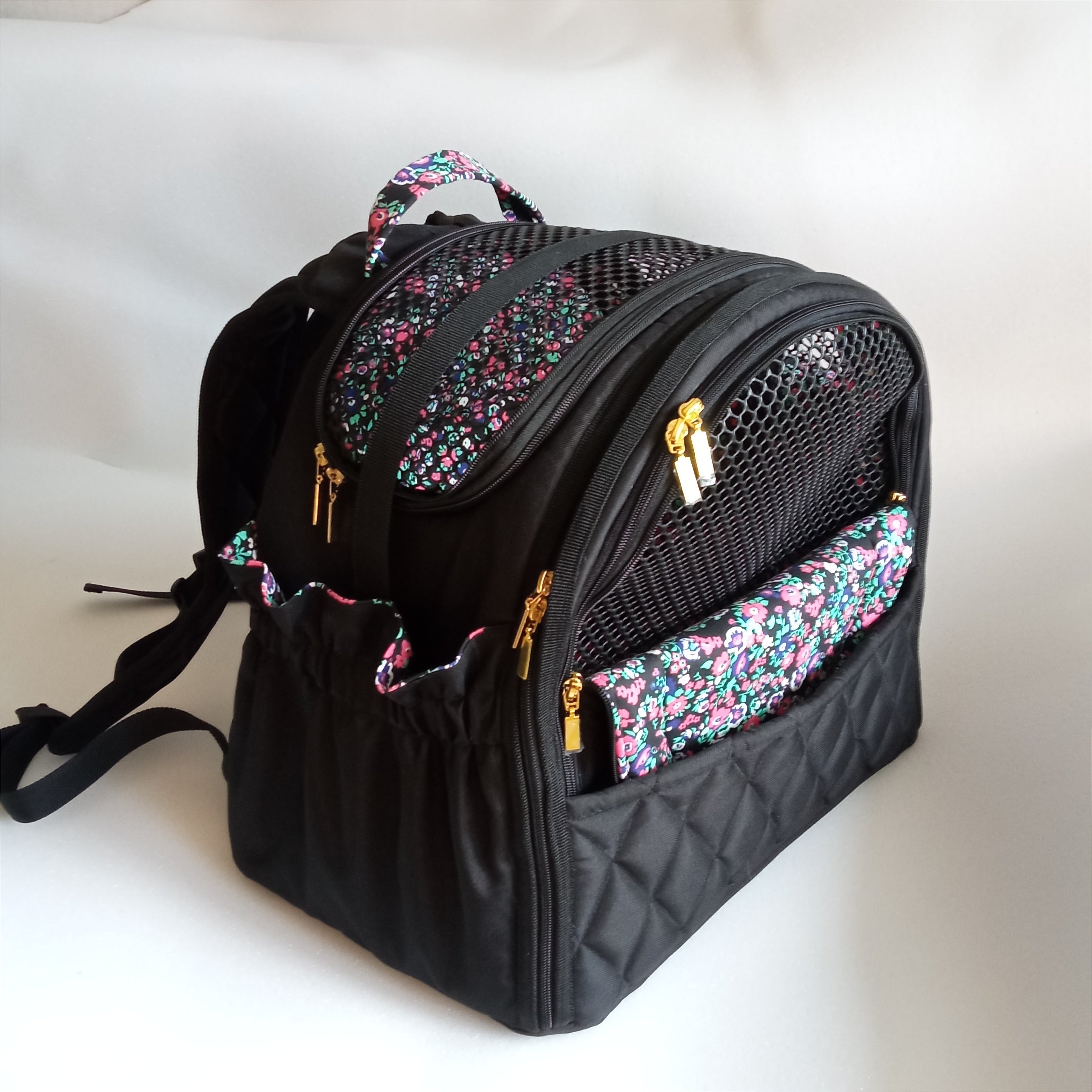 Pet backpack for small dogs and cats ( Black fabric with floral cotton lining)
