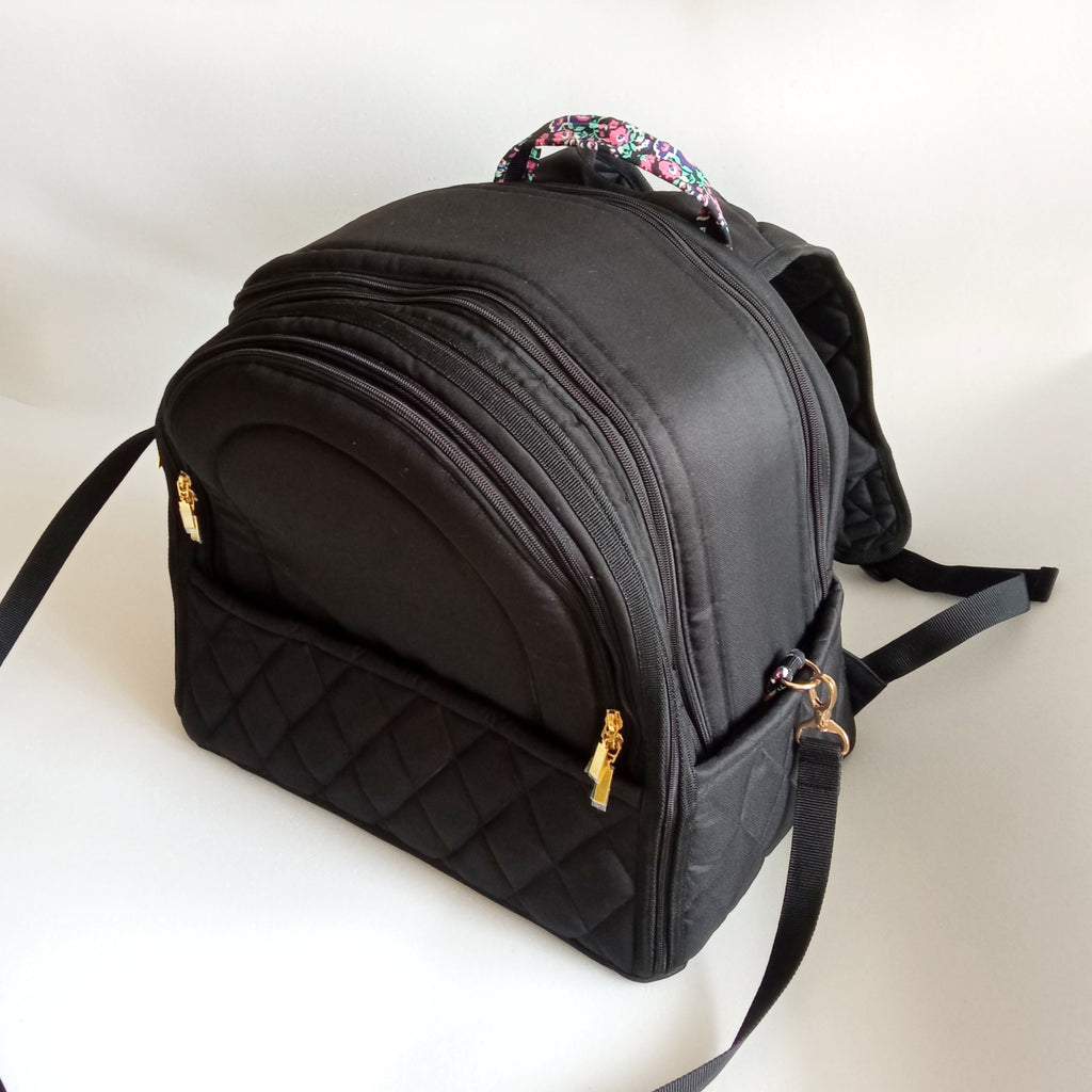 Pet backpack for small dogs and cats ( Black fabric with floral cotton lining)
